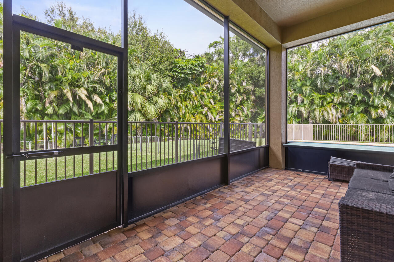 8300 Southwest Cattleya Drive Stuart, FL 34997 - Photo 47 of 77 a house view with a outdoor space