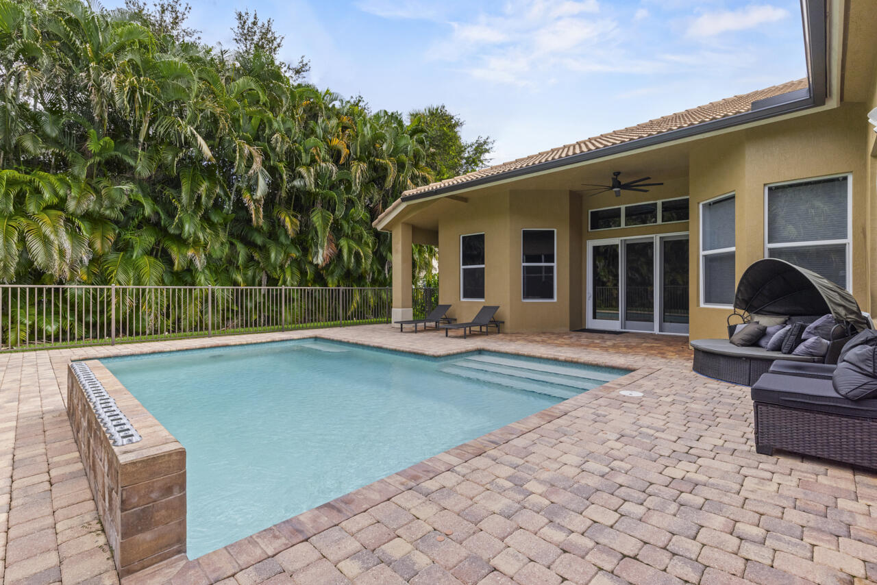 8300 Southwest Cattleya Drive Stuart, FL 34997 - Photo 54 of 77 a view of outdoor space yard and patio