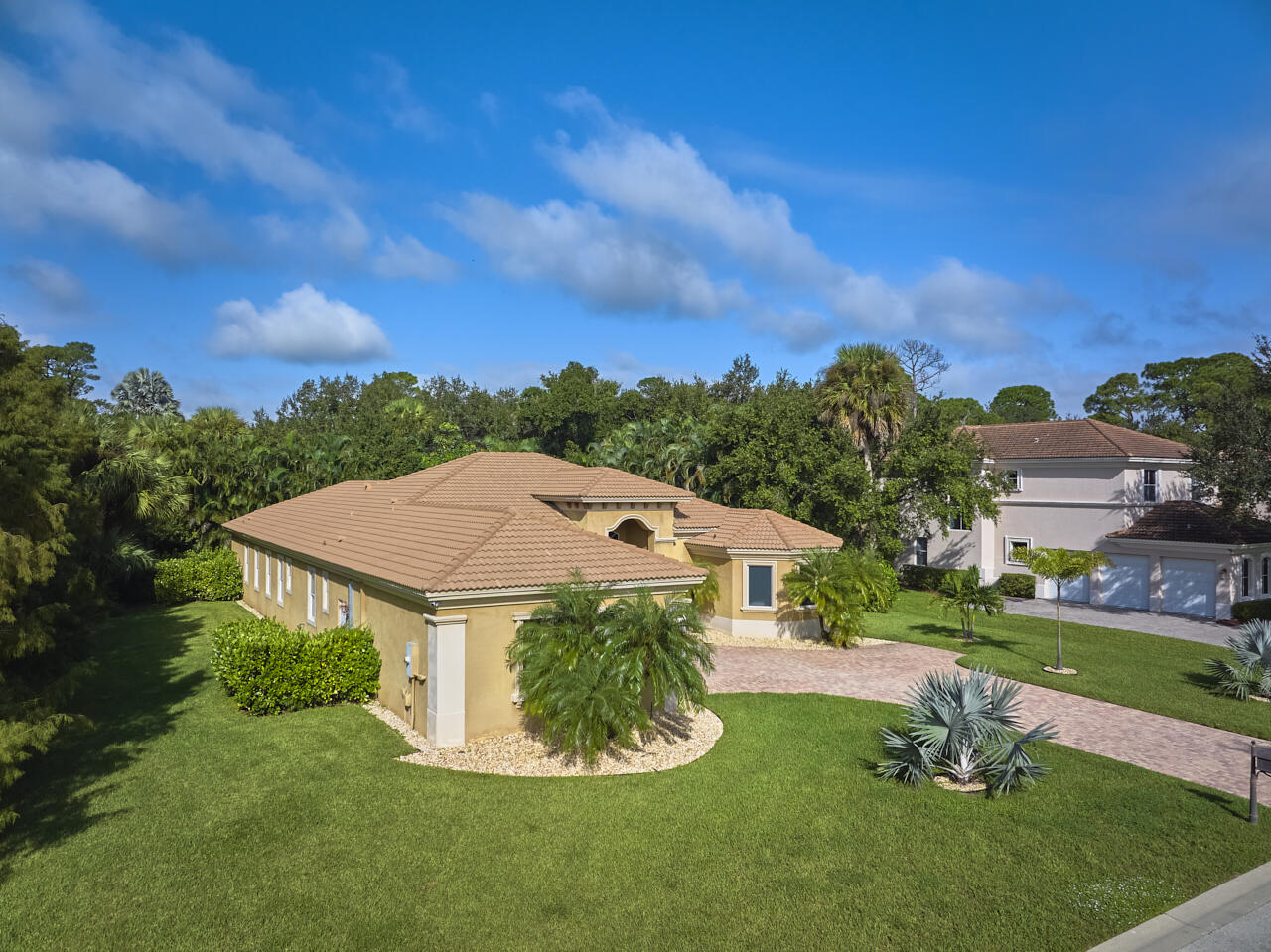 8300 Southwest Cattleya Drive Stuart, FL 34997 - Photo 59 of 77 a view of a house with a backyard porch and sitting area