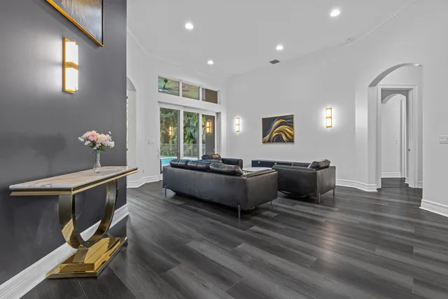 a bedroom with a bed and a table