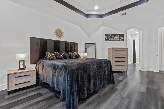 a view of hallway with wooden floor