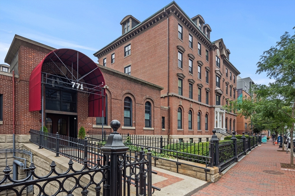 771 Harrison Avenue, Unit 207 Boston, MA 02118 - Photo 25 of 28 a view of a building with iron fence