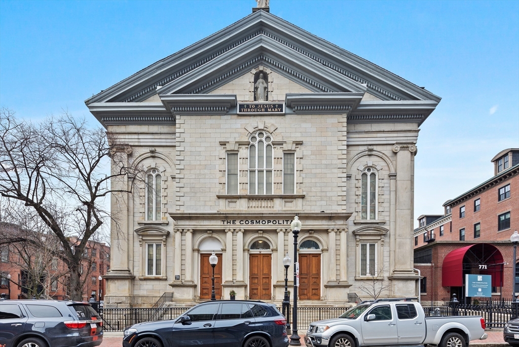 771 Harrison Avenue, Unit 207 Boston, MA 02118 - Photo 27 of 28 a front view of building with cars parked