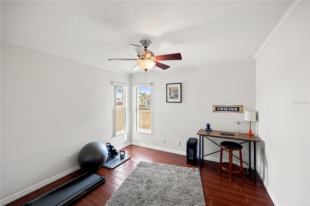 26223 Barcelos Court Punta Gorda, FL 33983 - Photo 24 of 34 a workspace with furniture and a window