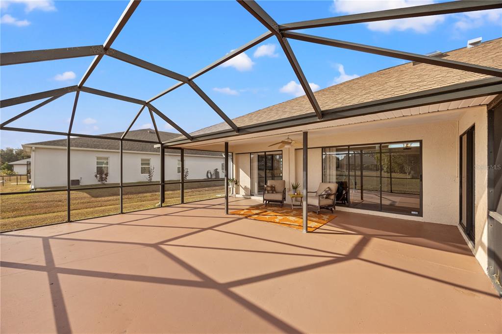 26223 Barcelos Court Punta Gorda, FL 33983 - Photo 28 of 34 a area with table and chairs