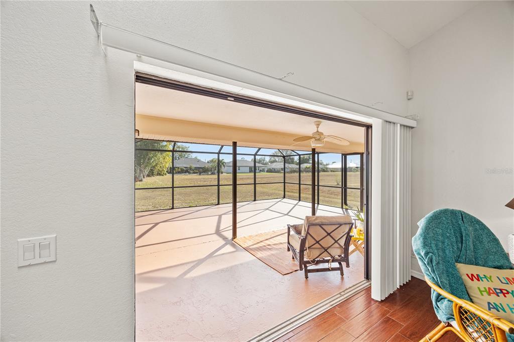 26223 Barcelos Court Punta Gorda, FL 33983 - Photo 8 of 34 a view of a room with lounge chair and windows