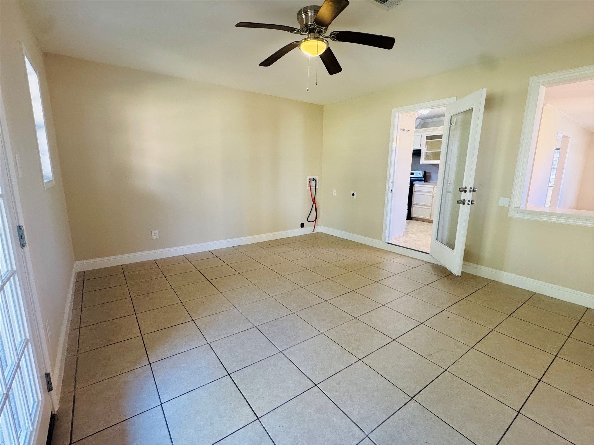 605 Tovrea Road Alvin, TX 77511 - Photo 15 of 18 a view of an empty room and window