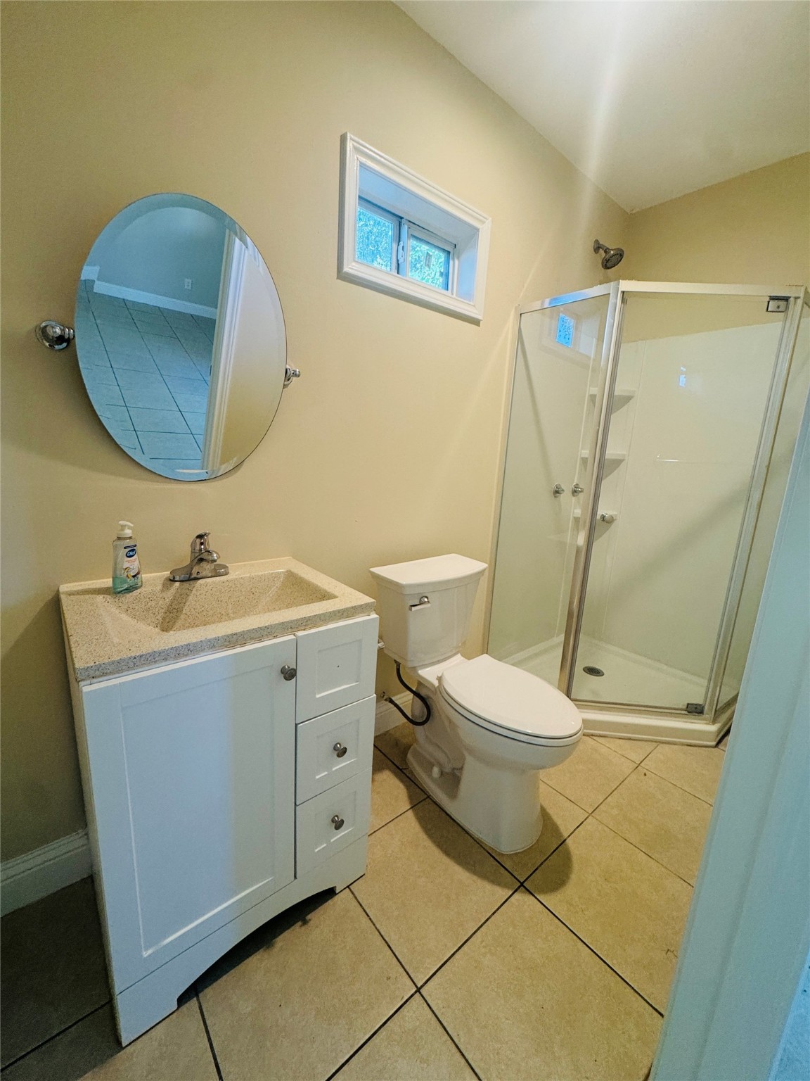 605 Tovrea Road Alvin, TX 77511 - Photo 17 of 18 a bathroom with a toilet sink and mirror