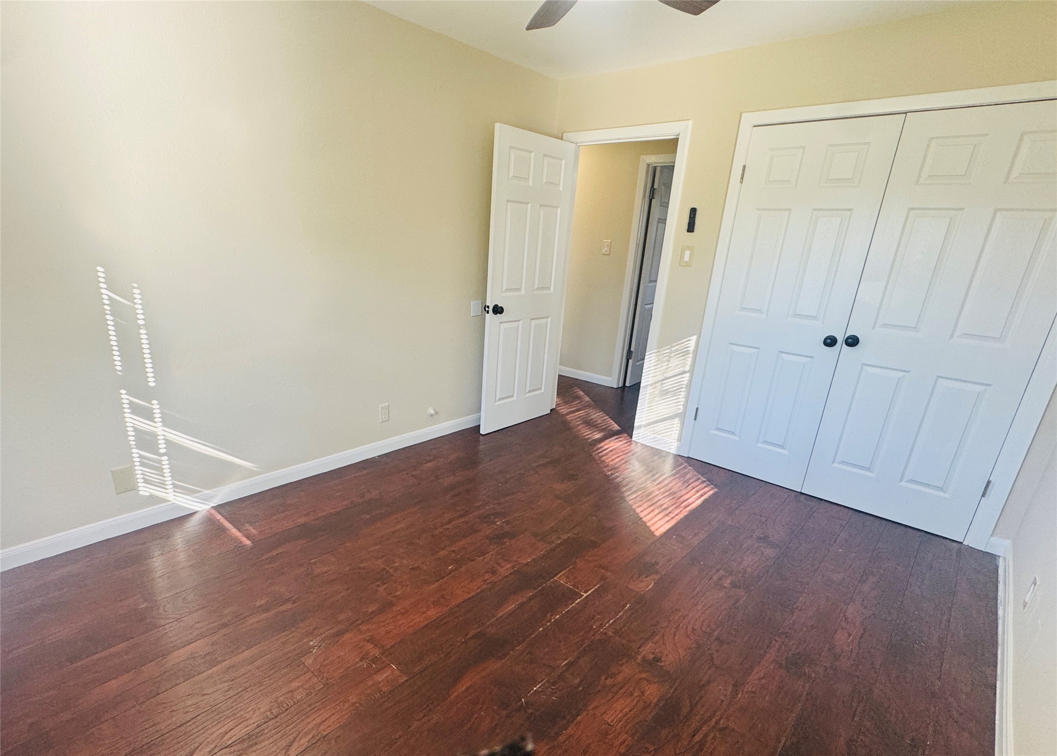 605 Tovrea Road Alvin, TX 77511 - Photo 10 of 18 an empty room with wooden floor and closet area