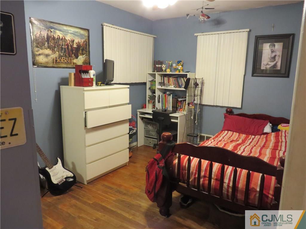 88 Princeton Road Old Bridge, NJ 08859 - Photo 8 of 10 a bedroom with furniture and a window
