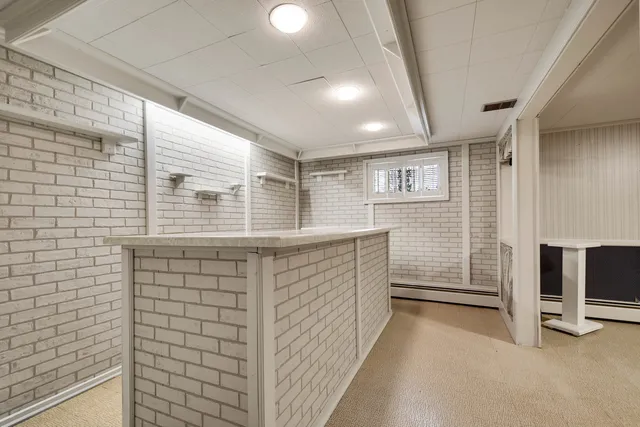 a bathroom with a sink and a shower