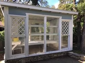a view of a house with a door and a window