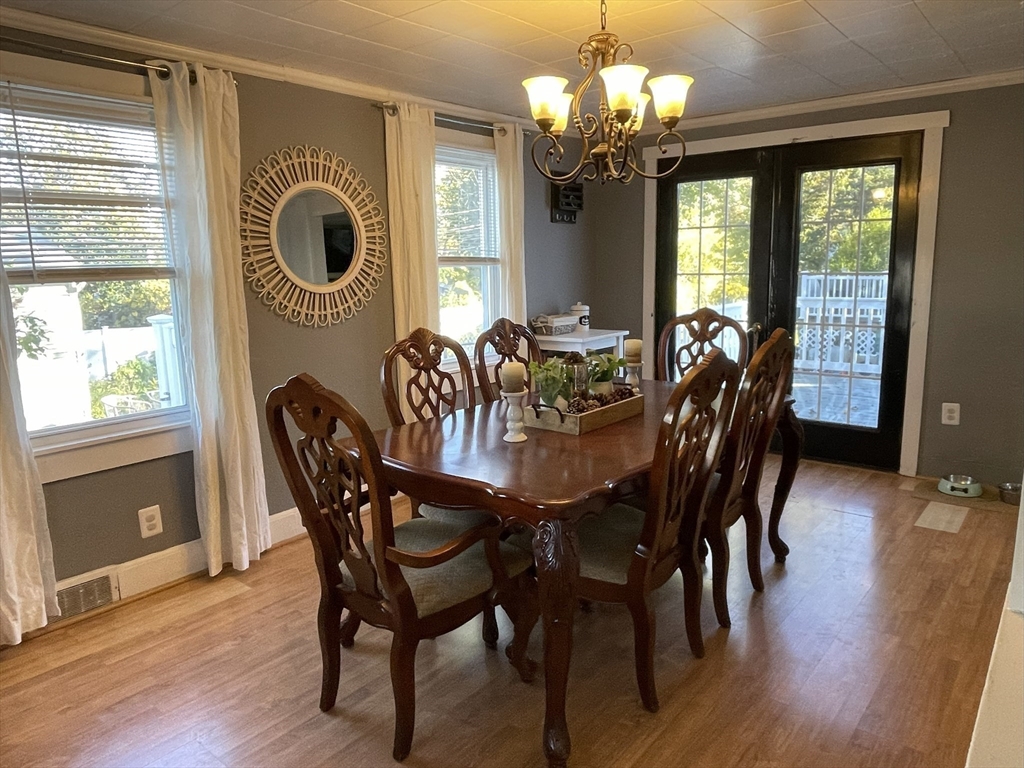 9 Watt Road Worcester, MA 01606 - Photo 13 of 36 a view of a dining room with furniture window and wooden floor