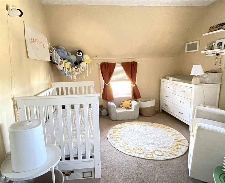 9 Watt Road Worcester, MA 01606 - Photo 20 of 36 a living room with furniture and a table