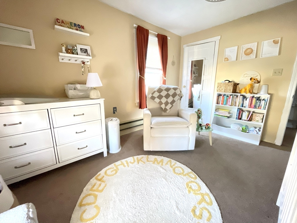 9 Watt Road Worcester, MA 01606 - Photo 21 of 36 a living room with furniture and a window