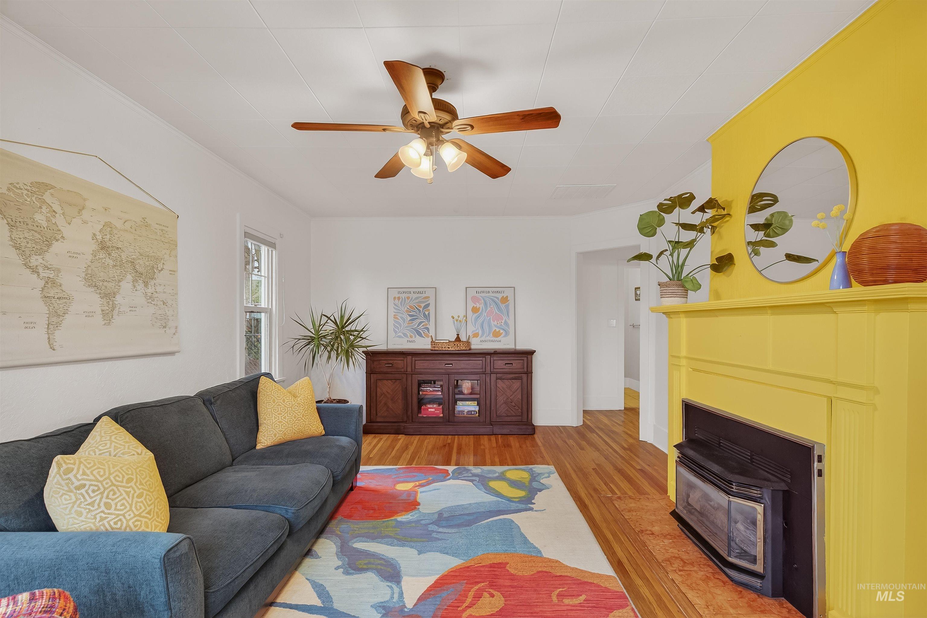 1209 3rd Street Lewiston, ID 83501 - Photo 4 of 49 Living room featuring light wood-type flooring and ceiling fan