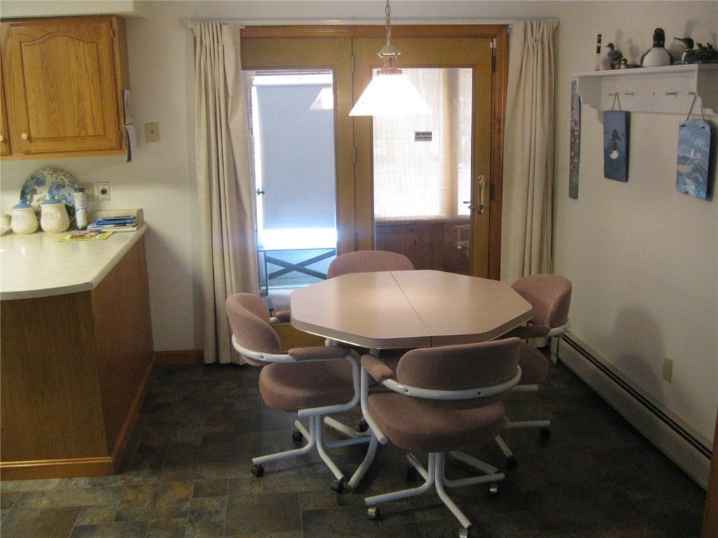 360 Alder Park Road China, ME 04358 - Photo 6 of 25 Dining area with door to enclosed...