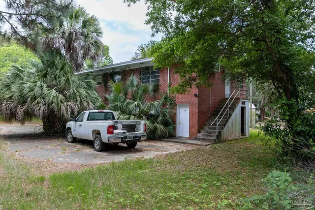 a car parked in front of a house