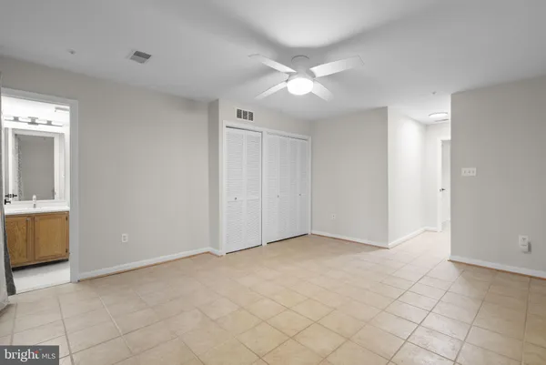 a view of an empty room with a sink