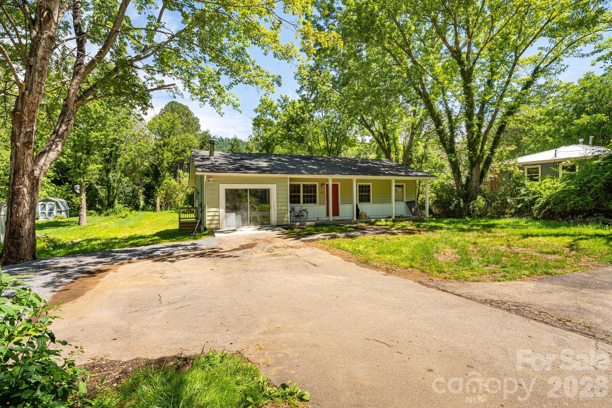 468 Beaverdam Road Asheville, NC 28804 - Photo 2 of 19 a view of house with yard and green space