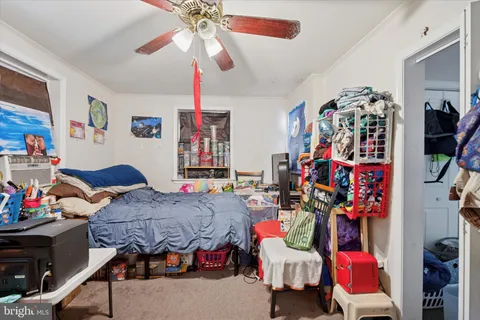 a bedroom with furniture and a bed