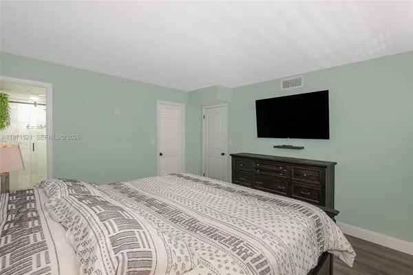 a bathroom with a sink and vanity