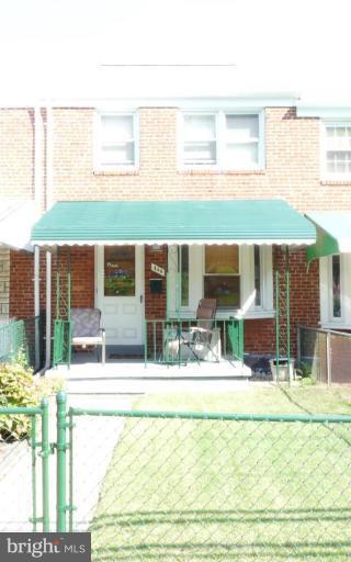 444 Stemmers Run Road Essex, MD 21221 - Photo 1 of 30 a swimming pool with outdoor seating