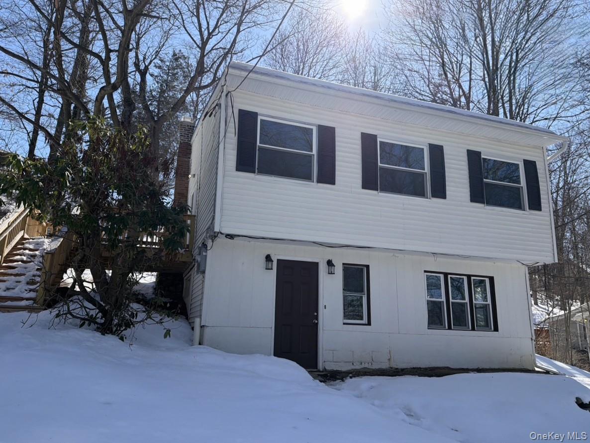 9 Underhill Trail Monroe, NY 10950 - Photo 1 of 18 a house that has a tree in front of the house