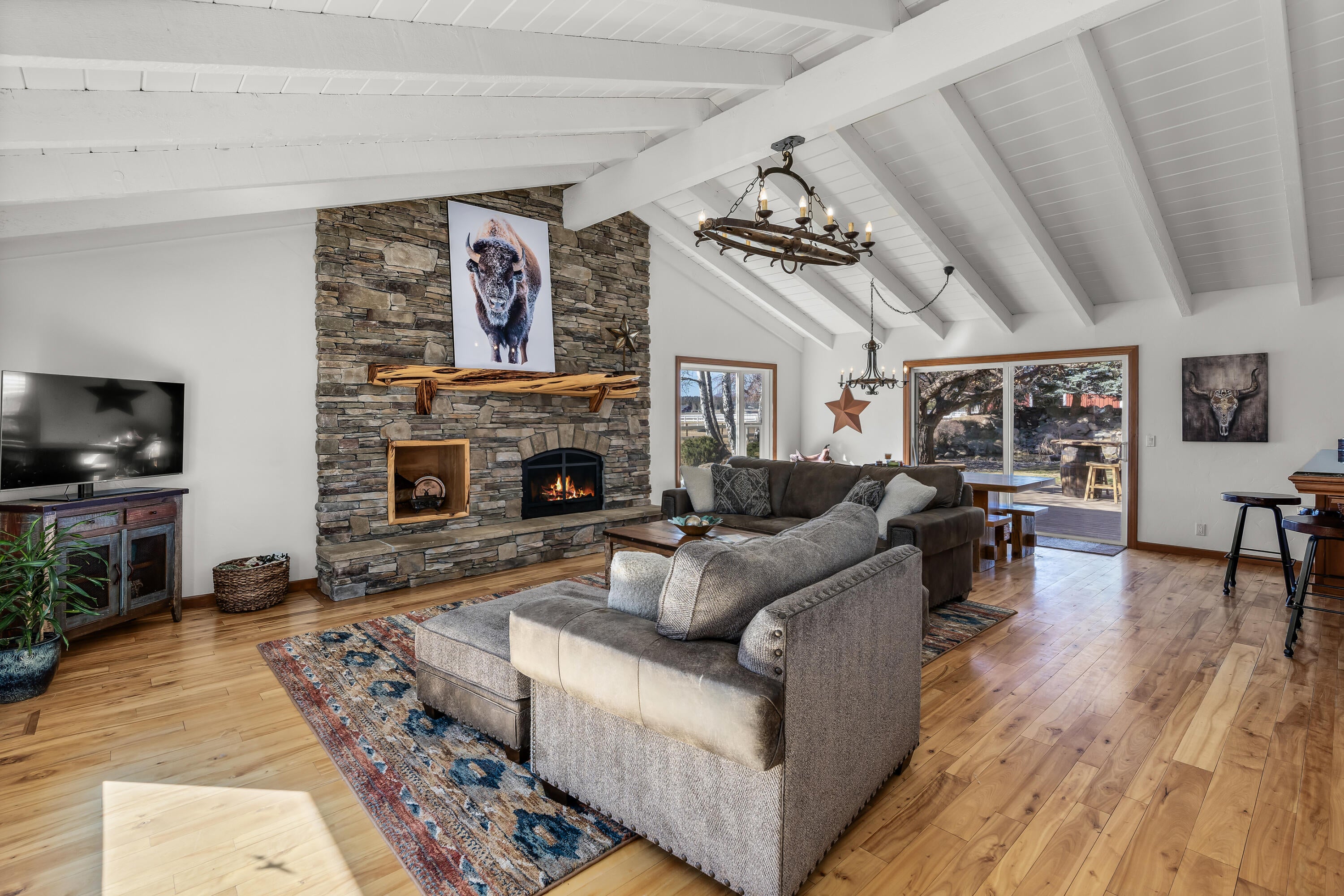 65161 Highland Road Bend, OR 97703 - Photo 21 of 66 Birch hardwood flooring in the vaulted great room.