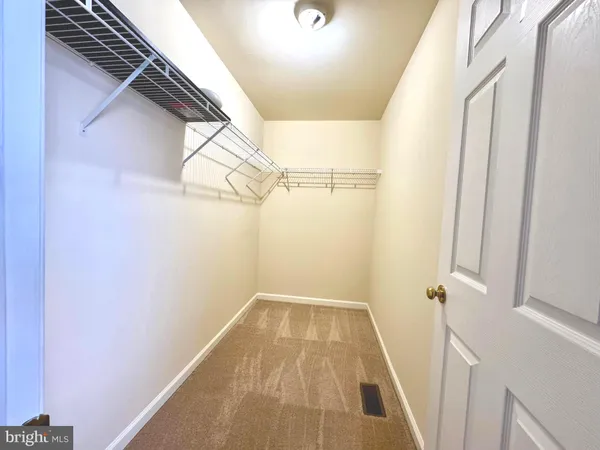 a view of small space with racks on the wall