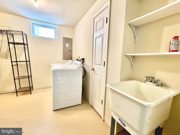 a bathroom with a sink and a tub