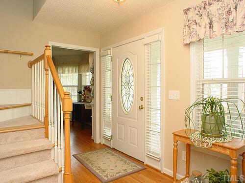 Hardwood Flooring and 1/2 bath at Entry
