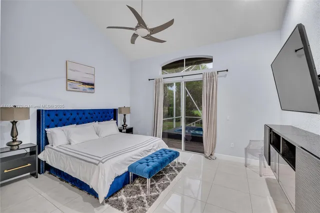 a living room with furniture and stairs