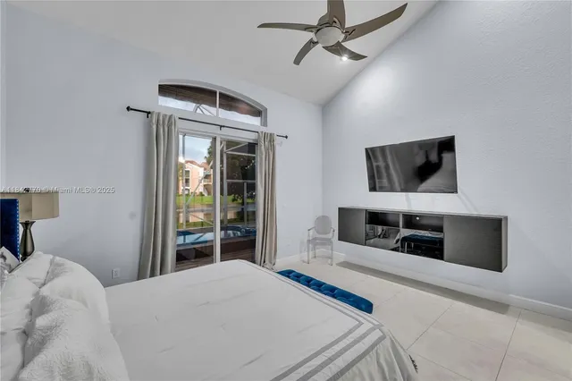 a dining room with a table and chairs