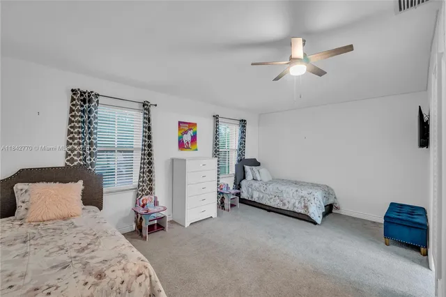 a white bath tub sitting in a bathroom