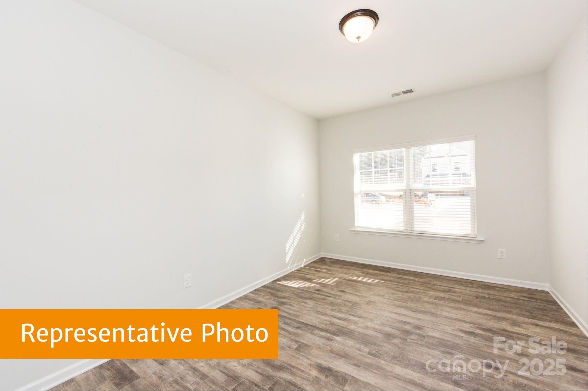 12155 Muscadine Court Midland, NC 28107 - Photo 11 of 20 a view of a room with window