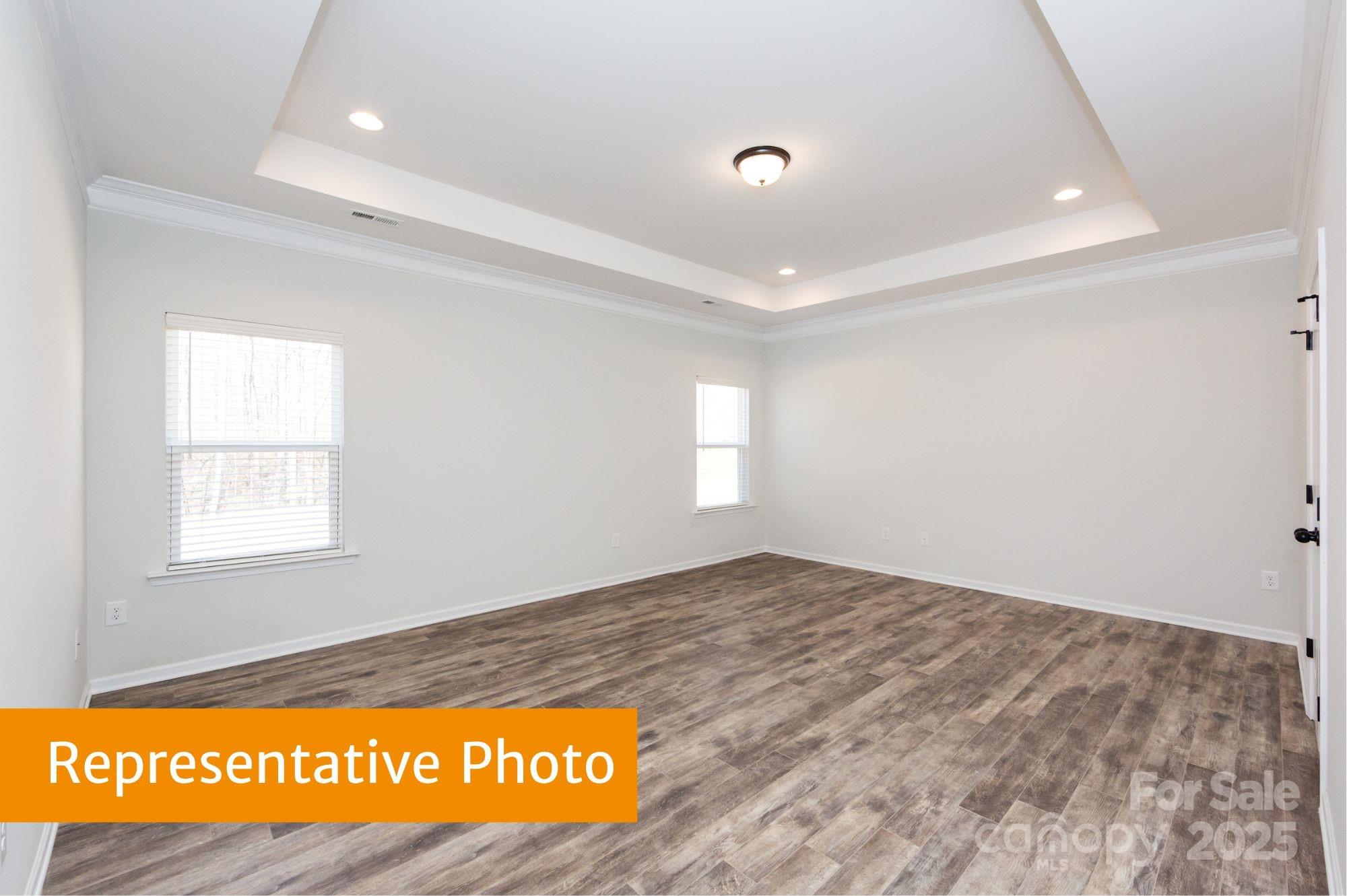 12155 Muscadine Court Midland, NC 28107 - Photo 17 of 20 a view of an empty room and window