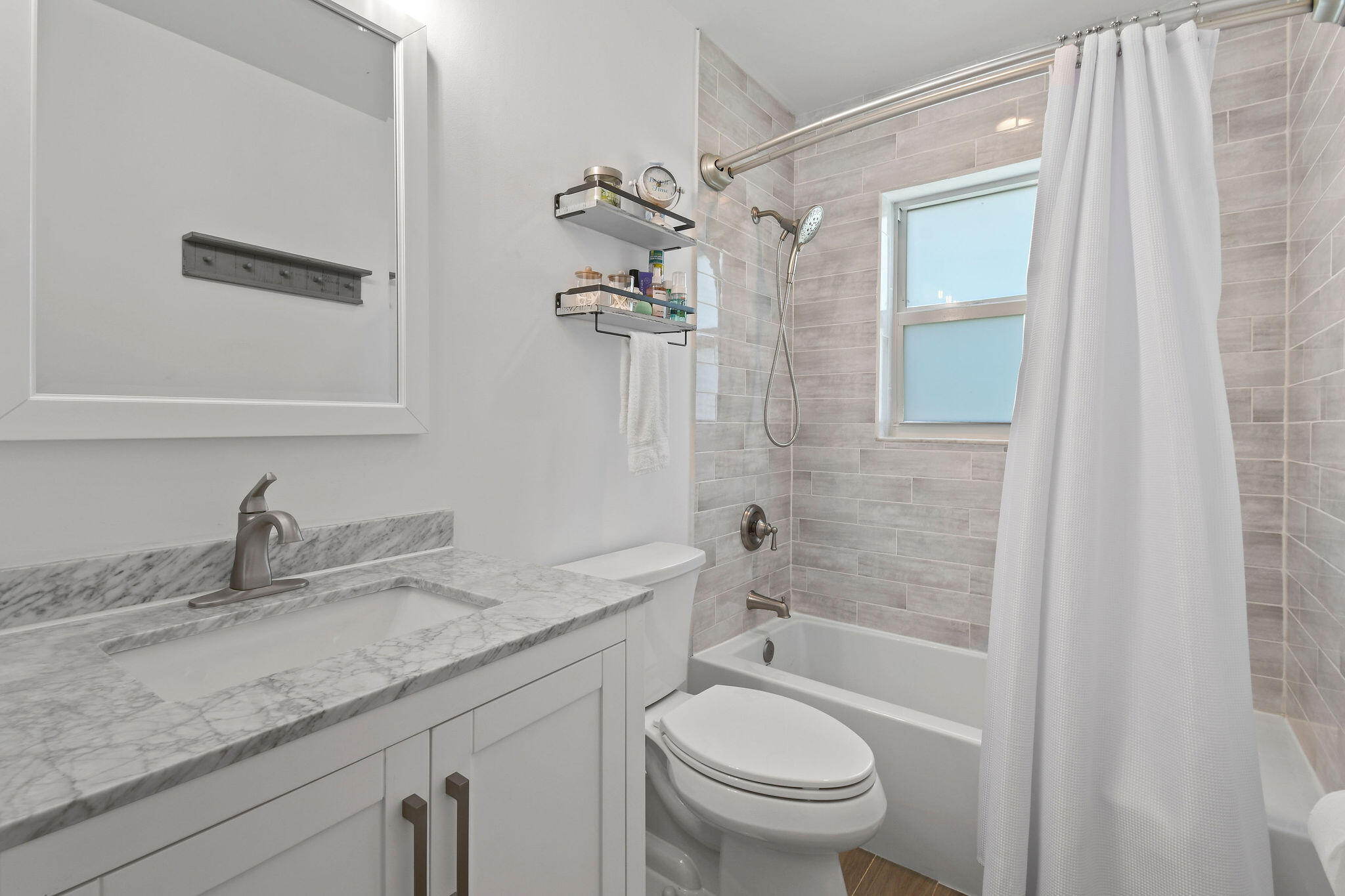 6698 Riparian Road Lake Worth, FL 33462 - Photo 31 of 52 Guest Bathroom