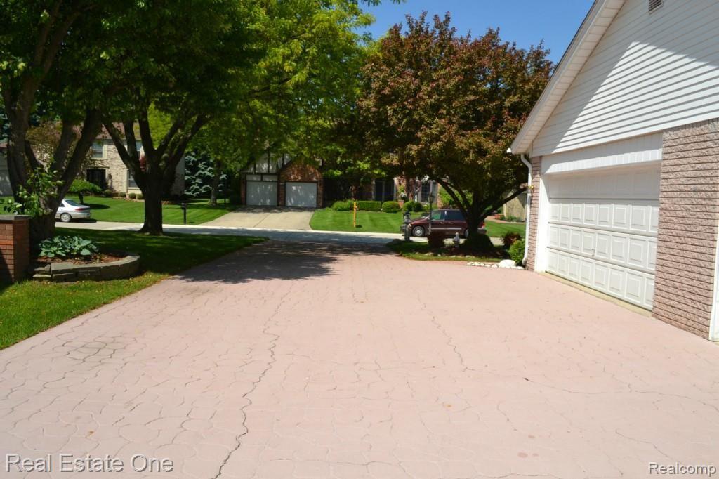 419 Lake Forest Road Rochester, MI 48309 - Photo 90 of 99 Custom Stamped concrete driveway