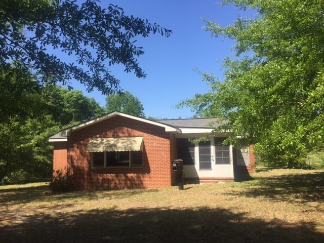 7851 Old Nowell Road, Unit A Macon, GA 31216 - Photo 2 of 10 a view of a house with a yard