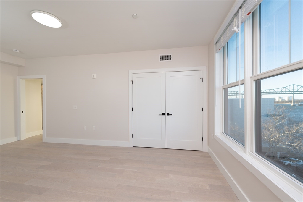 425 Border Street, Unit 307 Boston, MA 02128 - Photo 11 of 19 a view of an empty room