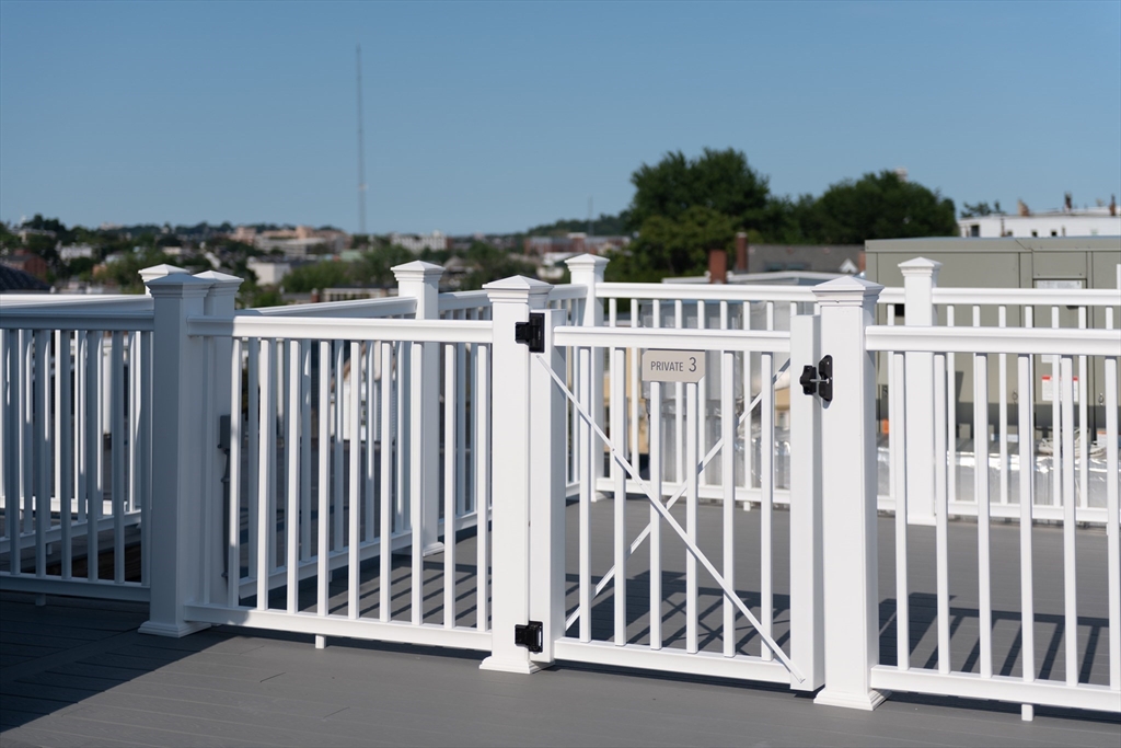 425 Border Street, Unit 307 Boston, MA 02128 - Photo 14 of 19 a view of a balcony with furniture