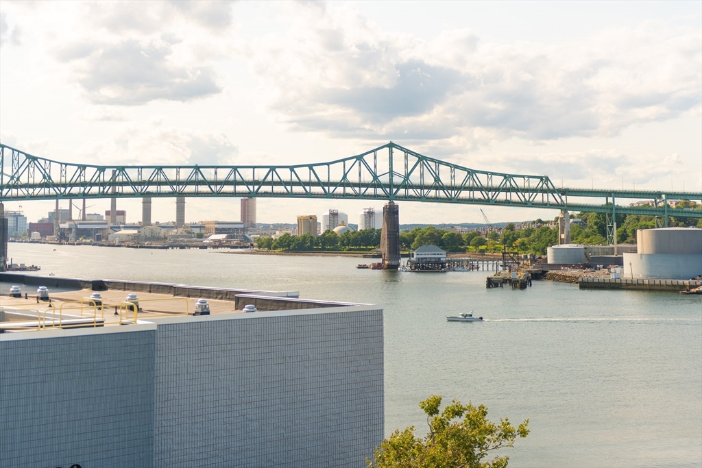 425 Border Street, Unit 307 Boston, MA 02128 - Photo 16 of 19 a view of a swimming pool and outdoor seating