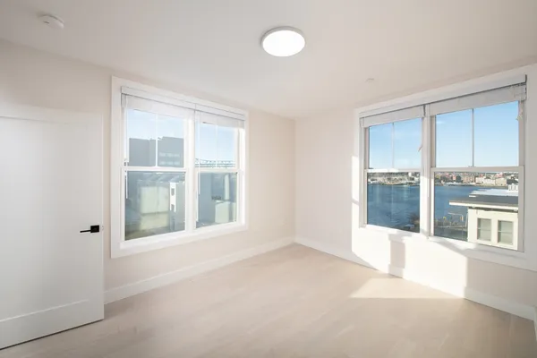 an empty room with windows