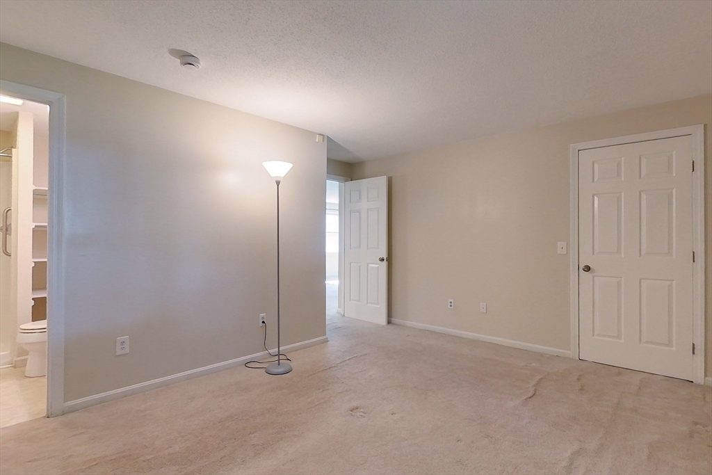 103 Main Street, Unit 10 Pepperell, MA 01463 - Photo 12 of 22 a view of an empty room