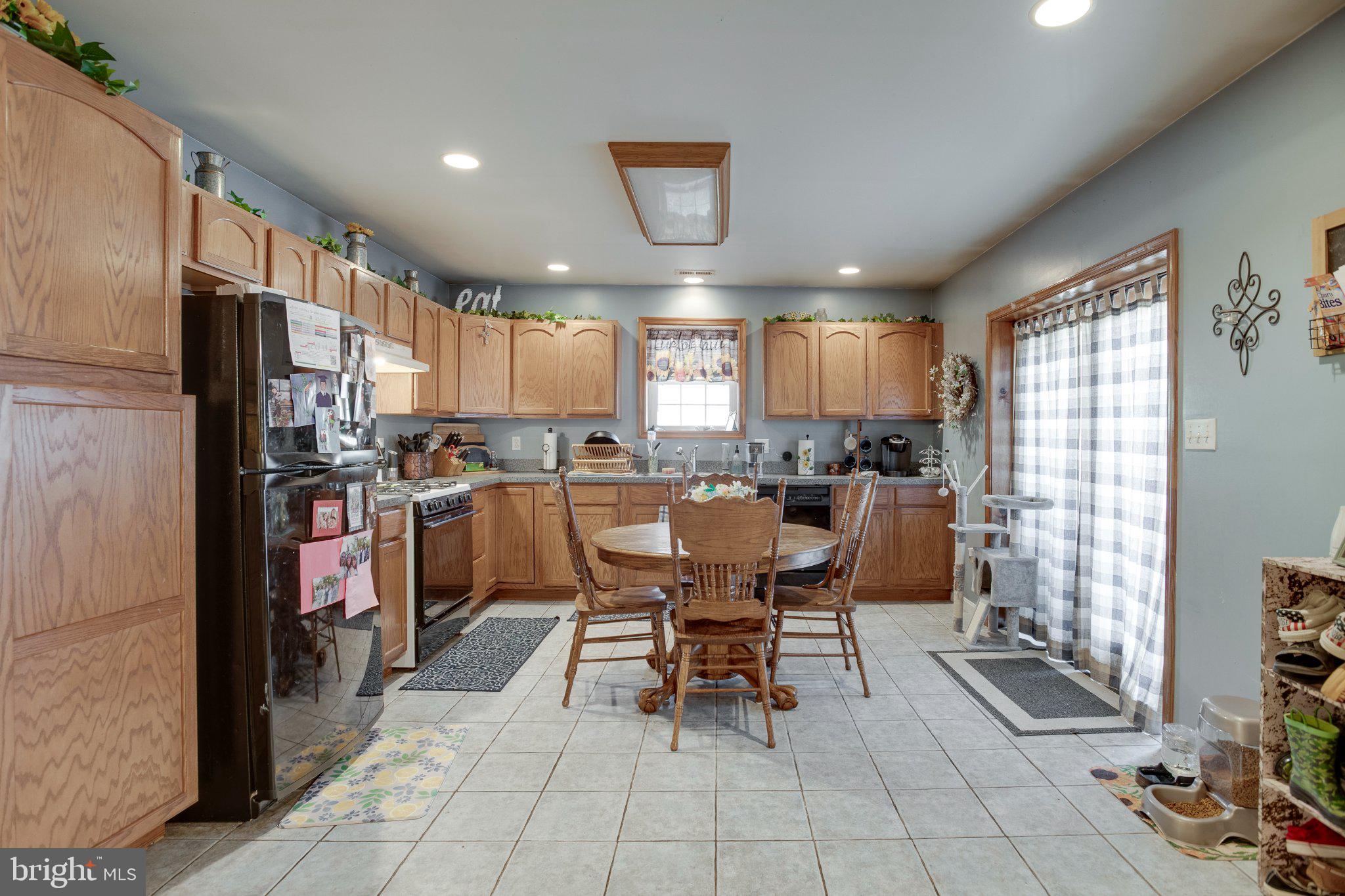 3220 Courtney School Road Midland, VA 22728 - Photo 61 of 111 lower level warm and inviting kitchen space.