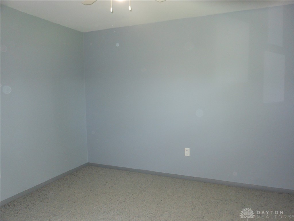 143 West Emerick Road West Milton, OH 45383 - Photo 17 of 37 This spacious room features a clean design with ample natural light, ready for your personal touch.