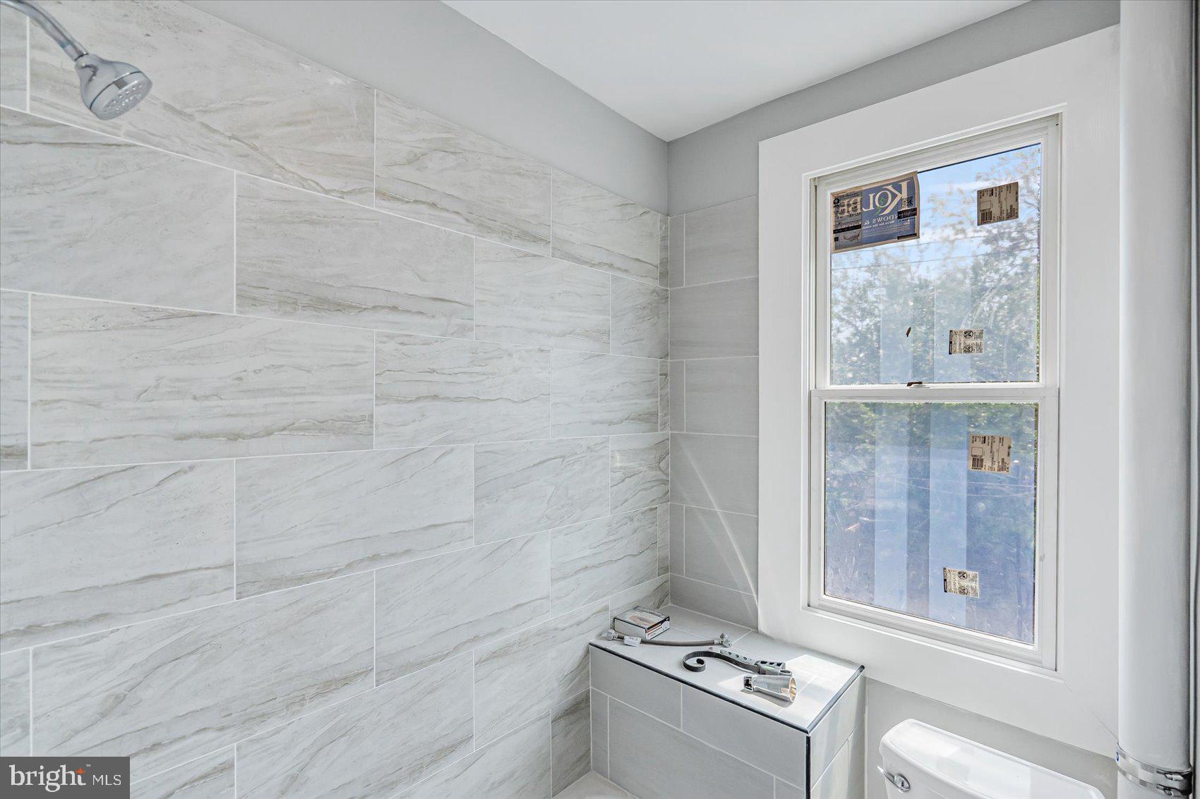 1607 Filbert Street Curtis Bay, MD 21226 - Photo 18 of 33 a bathroom with a sink and a mirror