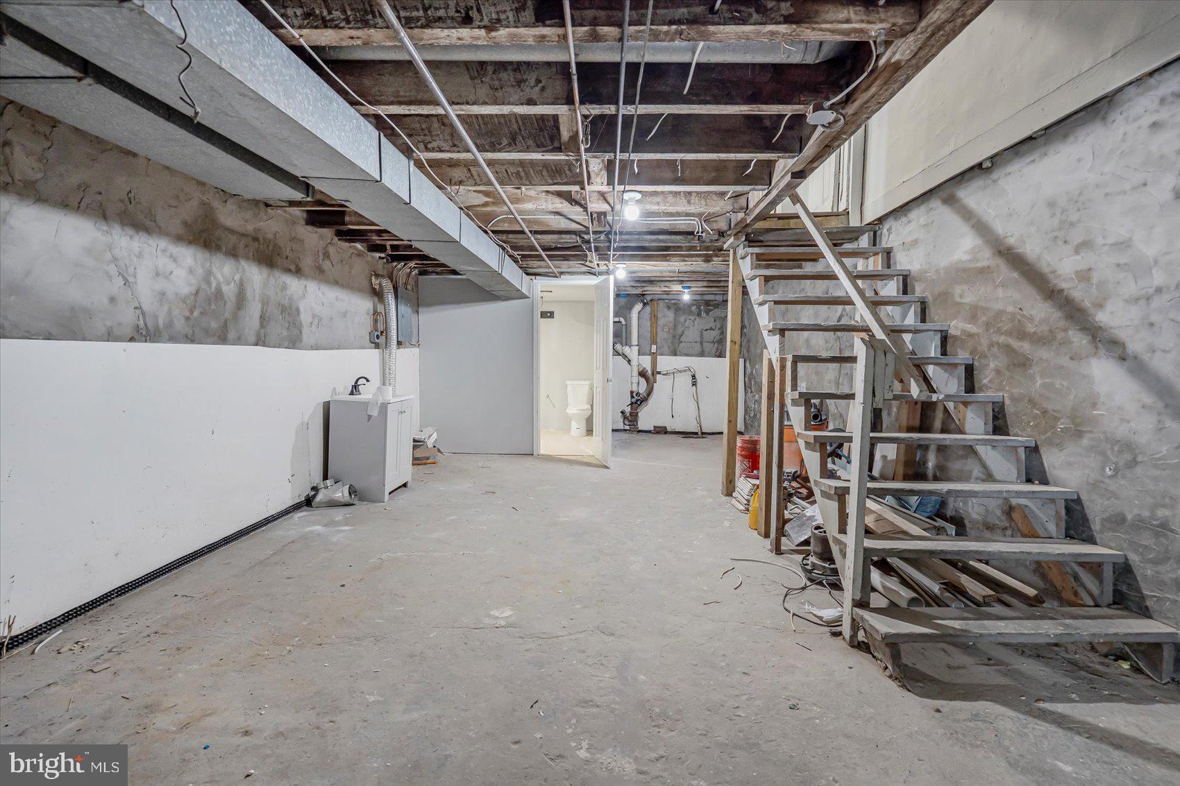 1607 Filbert Street Curtis Bay, MD 21226 - Photo 25 of 33 a view of an empty room with wooden ceiling