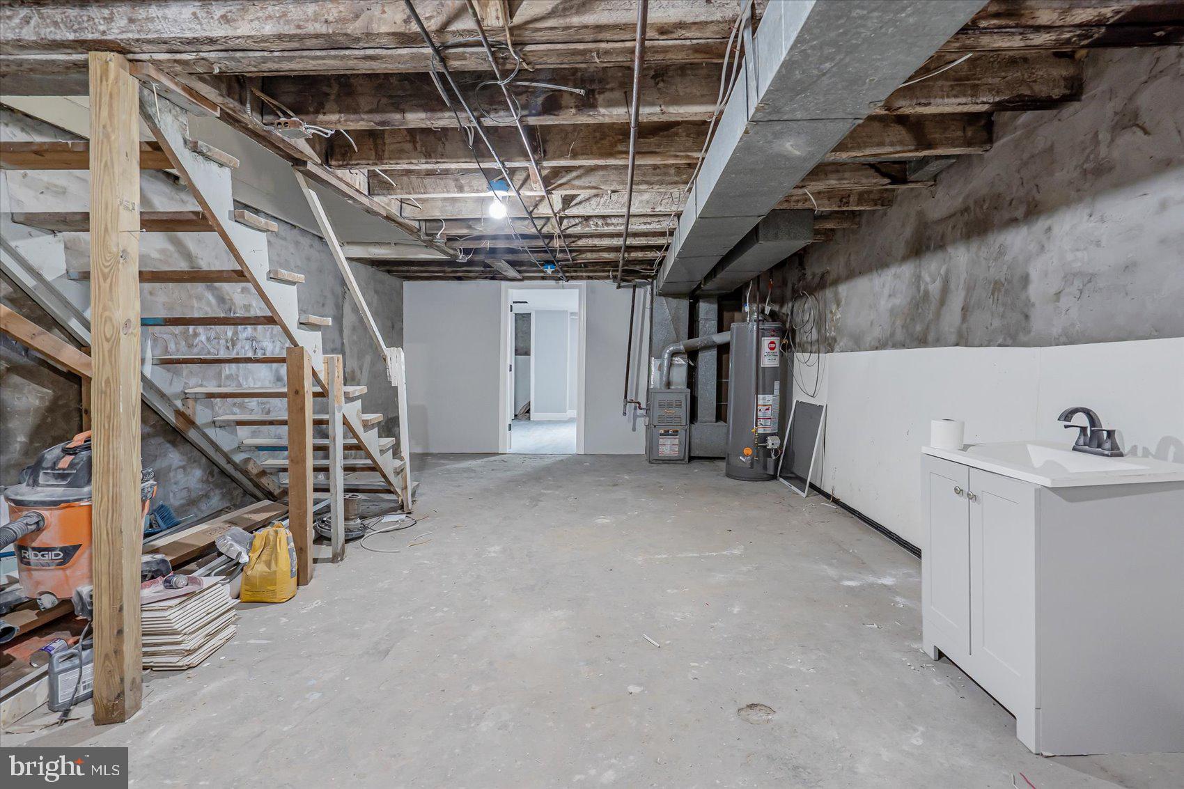 1607 Filbert Street Curtis Bay, MD 21226 - Photo 26 of 33 a view of an empty room with stairs